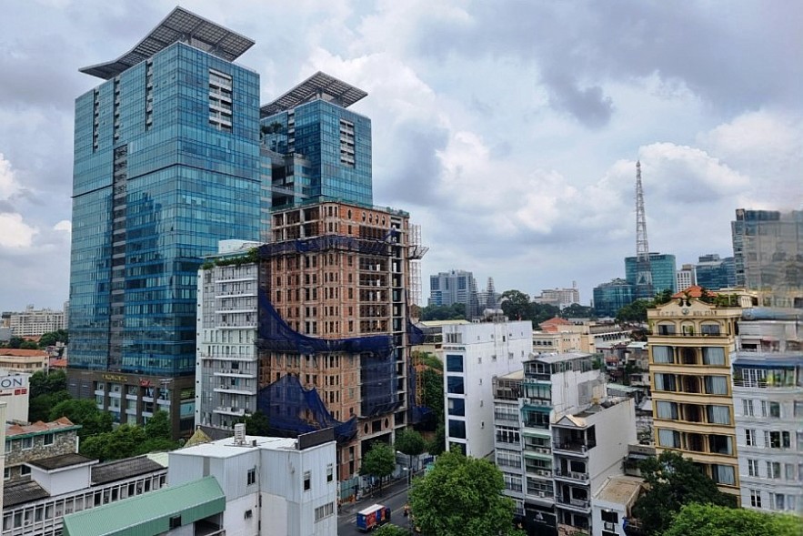 Chưa đầy 10 tháng năm 2022, TP. Hồ Chí Minh có thêm 2.255 doanh nghiệp kinh doanh bất động sản mới. Ảnh Đỗ Doãn