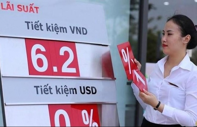 Áp lực giảm lãi suất huy động cho vay trong trung hạn vẫn còn