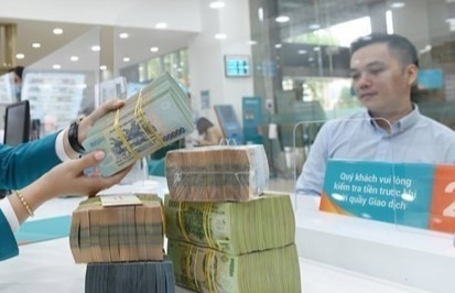 Reference exchange rate down 3 VND on March 31