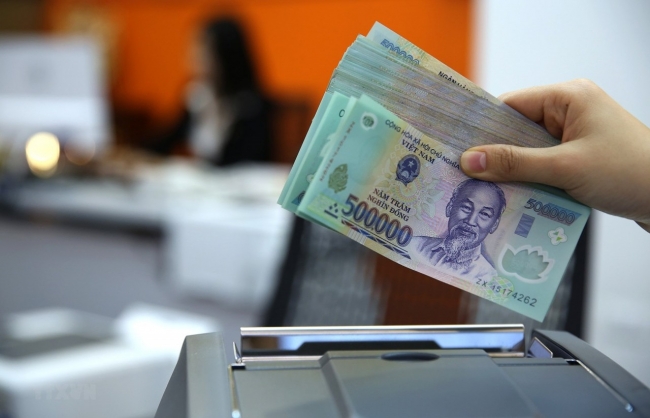 Thanh khoản dồi dào giúp Ngân hàng Nhà nước dừng hút tiền và giảm bơm tiền