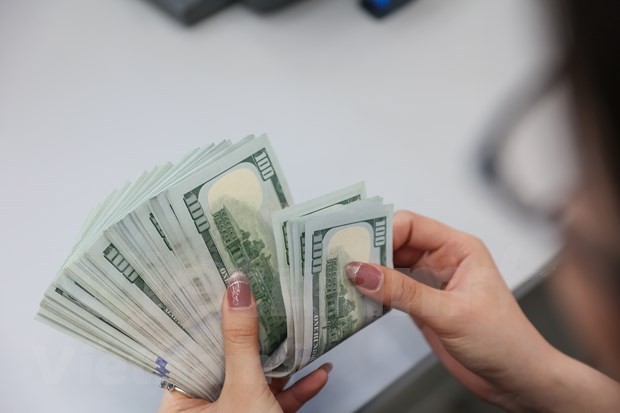 Reference exchange rate down 23 VND on July 11