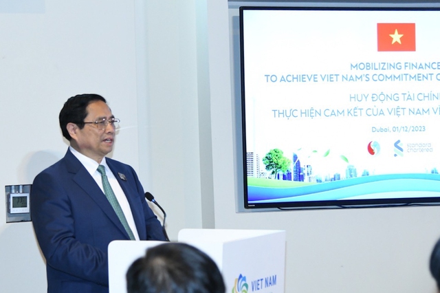 Thủ tướng chủ trì sự kiện huy động tài chính thực hiện cam kết của Việt Nam về biến đổi khí hậu- Ảnh 1.