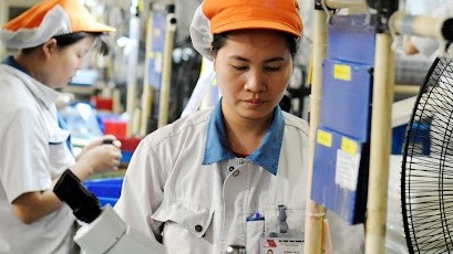 Vốn đầu tư "rót" mạnh vào Việt Nam trong khi dòng đầu tư toàn cầu trì trệ