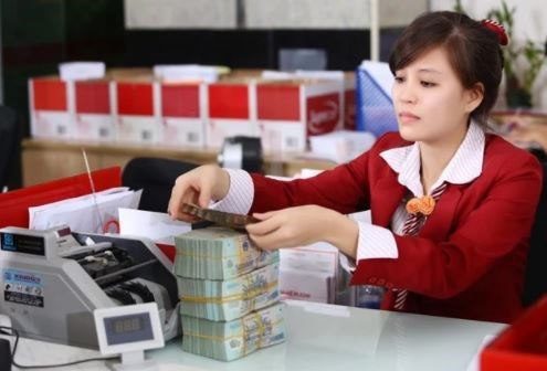 Bank credit increases again in March hinh anh 1