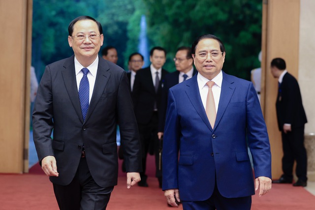 Thủ tướng Phạm Minh Chính gặp làm việc với Thủ tướng Lào Sonexay Siphandone- Ảnh 1.