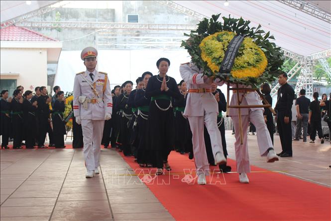 Dòng người tiếp tục nối dài viếng Tổng Bí thư Nguyên Phú Trọng tại quê nhà và TP Hồ Chí Minh Chú thích ảnh