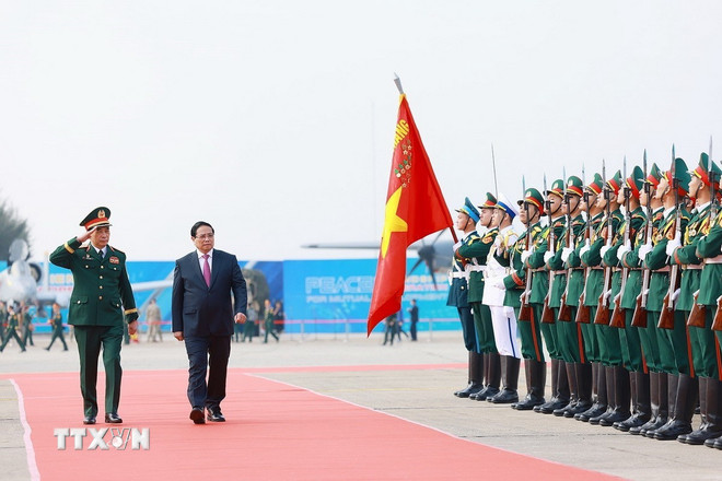 Lễ chào cờ khai mạc Triển lãm Quốc phòng quốc tế Việt Nam 2024. (Ảnh: Văn Điệp/ TTXVN) ttxvn-1912-trien-lam-quoc-phong-quoc-te-3.jpg