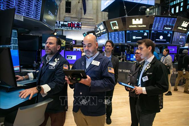 Báo cáo tích cực của doanh nghiệp tạo đà cho thị trường chứng khoán Mỹ tăng điểm Chú thích ảnh