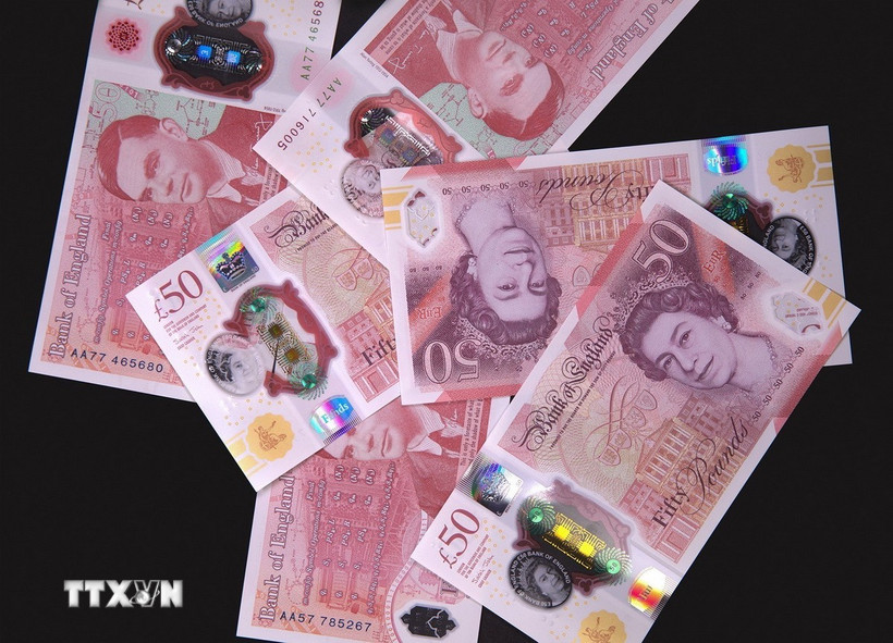 Đồng tiền mệnh giá 50 bảng Anh. (Ảnh: AFP/TTXVN)