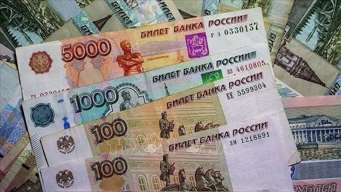 Đồng ruble tăng mạnh nhất hơn 30 năm, đứng đầu trong các đồng tiền trên thế giới Chú thích ảnh