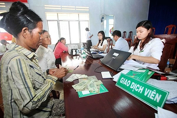 iểm giao dịch của NHCSXH tại xã là địa chỉ quen thuộc của người nghèo và các đối tượng chính sách trên địa bàn tỉnh Gia Lai. Nguồn: VBSP.