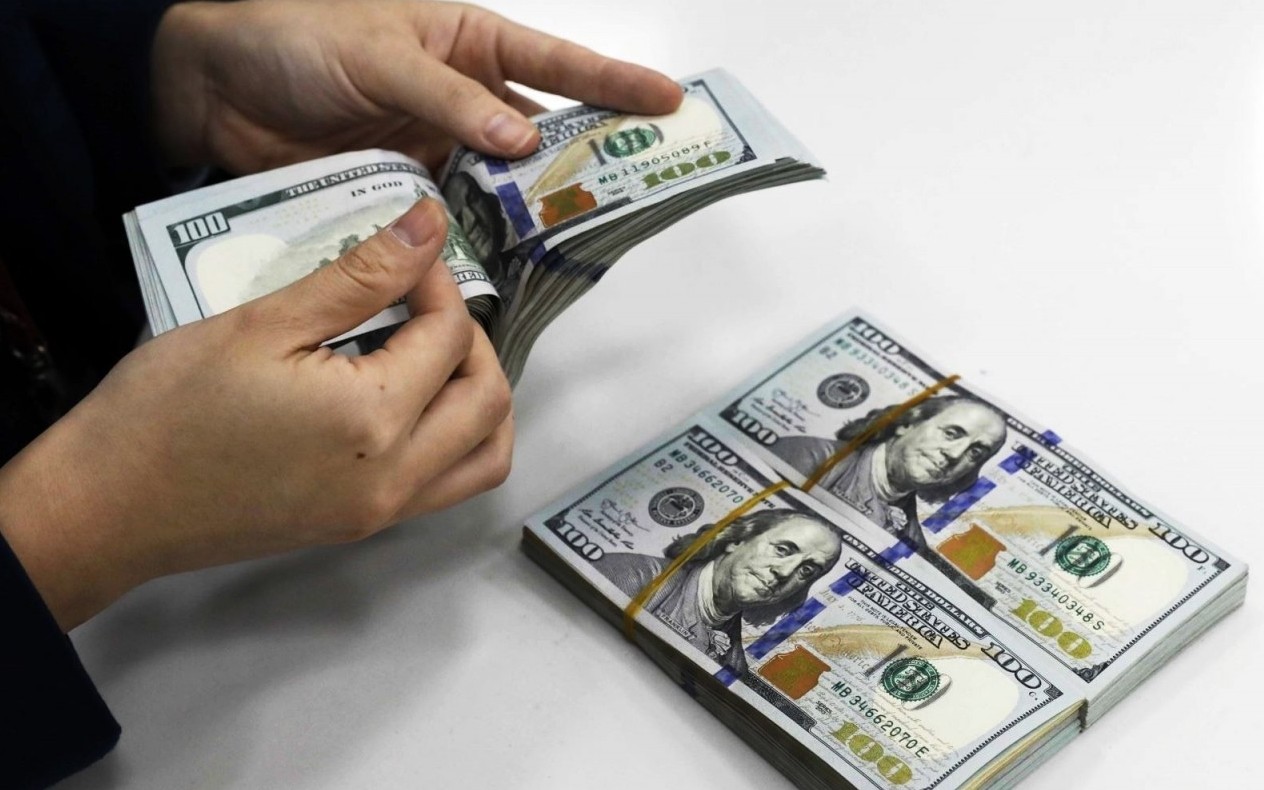Tỷ giá USD hôm nay (26/3): Thế giới tăng, Ngân hàng Nhà nước giảm