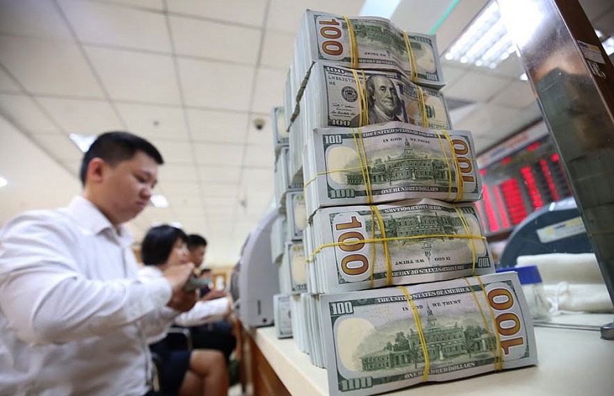 Áp lực lên tỷ giá lớn dần, nhưng Việt Nam vẫn có “bộ đệm” tốt để ổn định