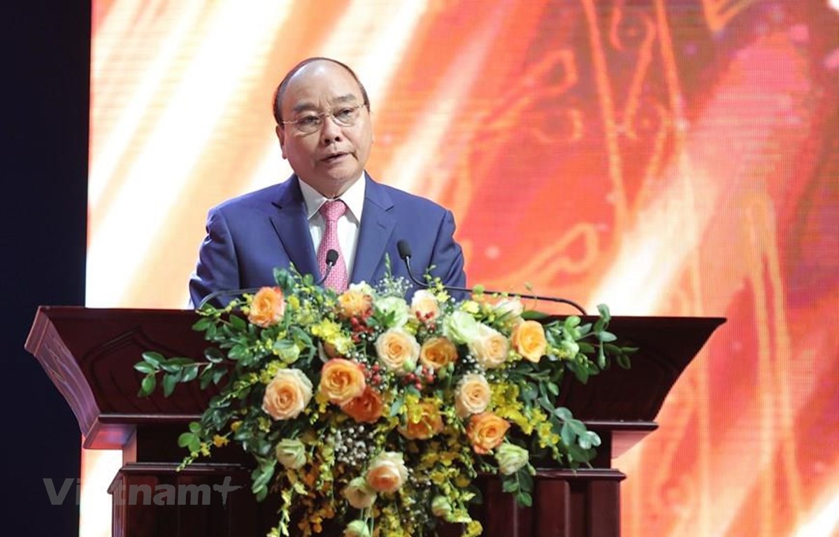 Chủ tịch nước Nguyễn Xuân Phúc phát biểu khai mạc Lễ trao giải. (Ảnh: Hoàng Đạt/Vietnam+)
