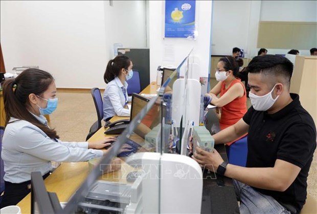 Central bank revises up interest rates by 1% from October 25 hinh anh 2