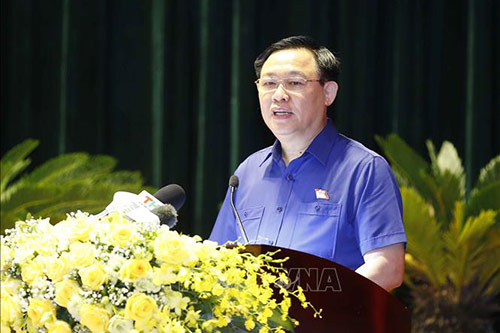 Chủ tịch Quốc hội Vương Đình Huệ trình bày chương trình hành động.