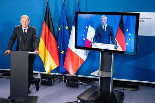 Bộ trưởng Tài chính Đức Olaf Scholz (trái) và hình ảnh Bộ trưởng Tài chính Pháp Bruno Le Maire.