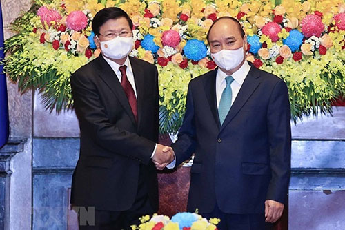 Chủ tịch nước Nguyễn Xuân Phúc hội kiến Tổng Bí thư, Chủ tịch nước Lào Thongloun Sisoulith