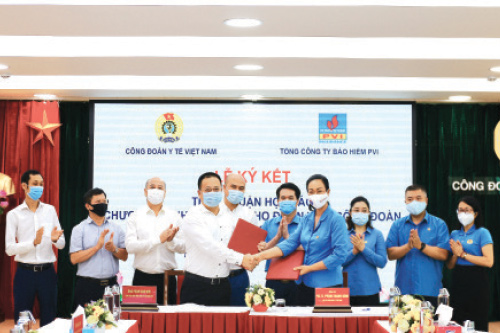 Tổng công ty Bảo hiểm PVI và Công đoàn Y tế Việt Nam ký kết thỏa thuận hợp tác.  &#9;&#9;&#9;&#9;&#9;&#9;  Ảnh: DN