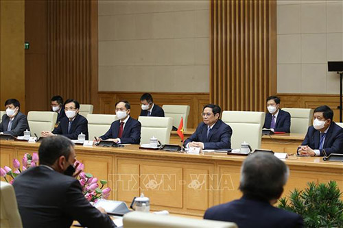 Thủ tướng Phạm Minh Chính và các thành viên đoàn Việt Nam tại buổi tiếp.