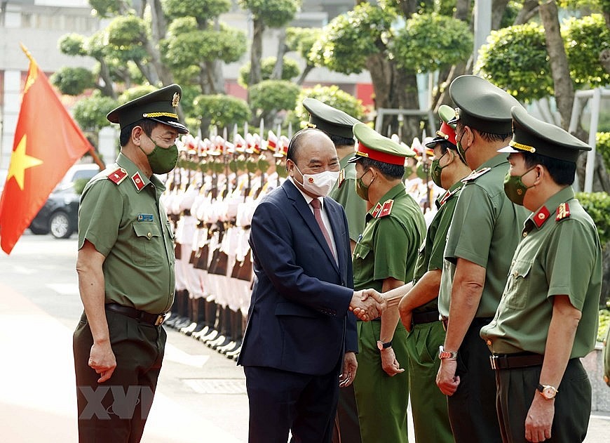 Hình ảnh Chủ tịch nước Nguyễn Xuân Phúc chúc Tết Công an Thành phố Hồ Chí Minh