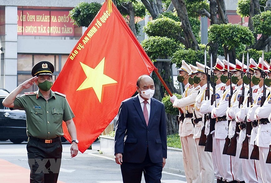 Hình ảnh Chủ tịch nước Nguyễn Xuân Phúc chúc Tết Công an Thành phố Hồ Chí Minh