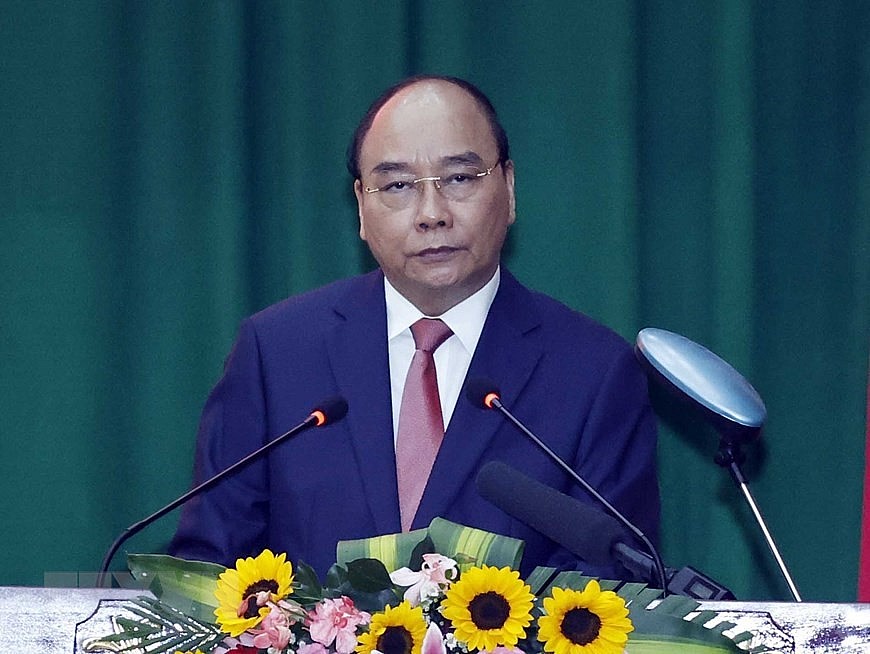 Hình ảnh Chủ tịch nước Nguyễn Xuân Phúc chúc Tết Công an Thành phố Hồ Chí Minh