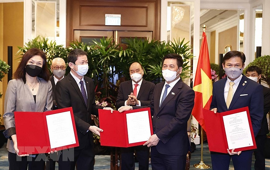 Chùm ảnh: Chủ tịch nước Nguyễn Xuân Phúc tiếp lãnh đạo một số tập đoàn của Singapore