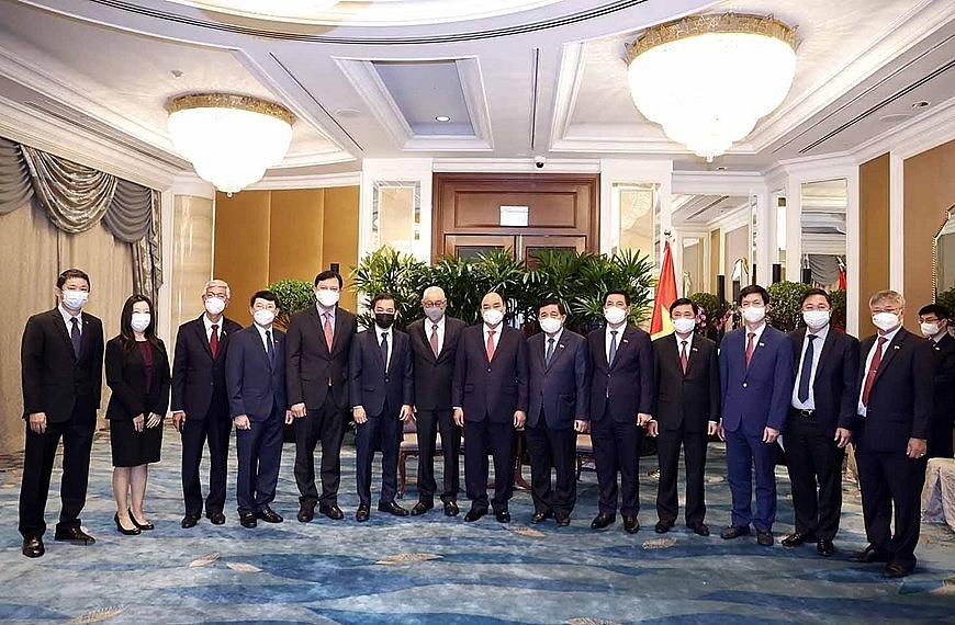 Chùm ảnh: Chủ tịch nước Nguyễn Xuân Phúc tiếp lãnh đạo một số tập đoàn của Singapore