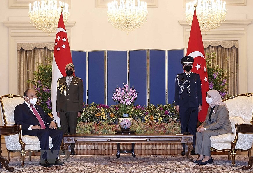 Chùm ảnh: Lễ đón Chủ tịch nước Nguyễn Xuân Phúc thăm cấp Nhà nước tới Singapore
