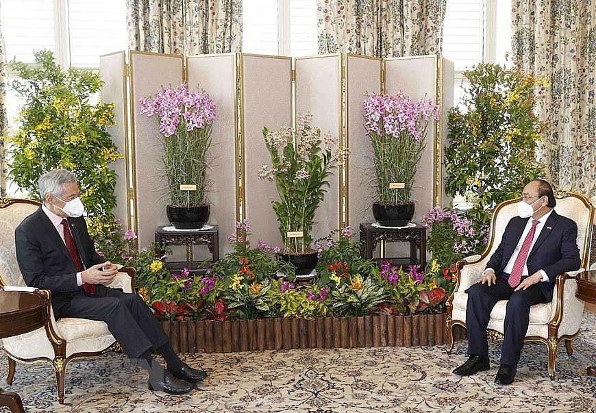 Chùm ảnh: Lễ đón Chủ tịch nước Nguyễn Xuân Phúc thăm cấp Nhà nước tới Singapore