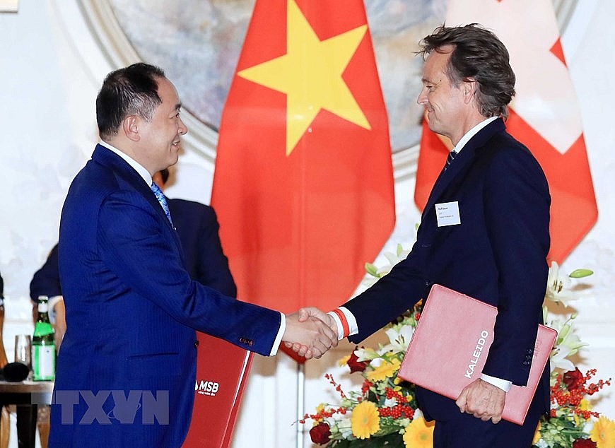 Chùm ảnh: Chủ tịch nước dự Diễn đàn Doanh nghiệp Việt Nam-Thụy Sĩ