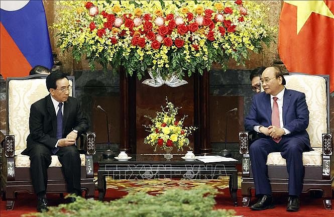Chủ tịch nước: Tiềm năng hợp tác giữa hai nước Việt Nam - Lào còn rất lớn